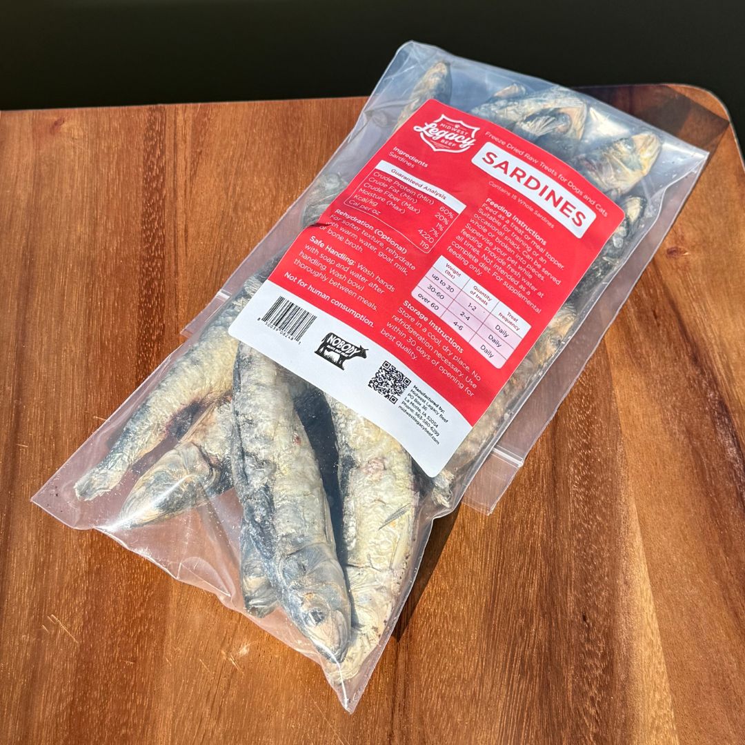 Freeze dried sardines with red label on wood counter