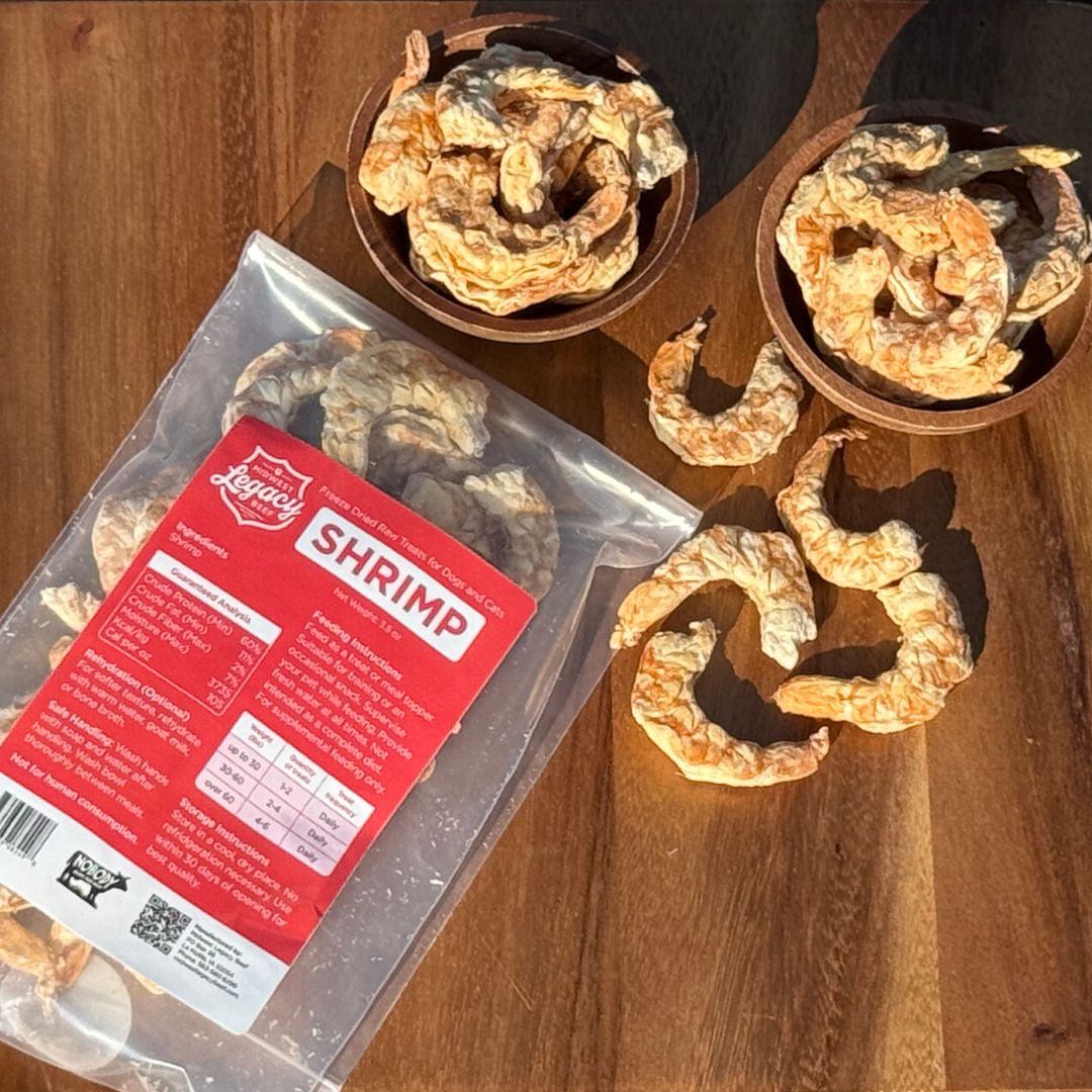 Freeze dried shrimp in a package with a red label on a wooden surface