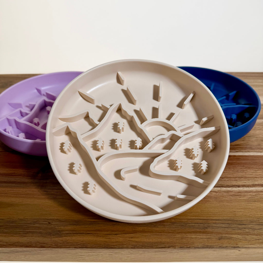White silicone slow feeder bowl with beige prong insert and raised divider pattern